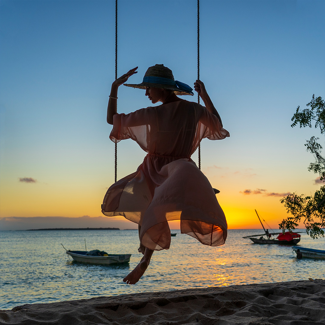 beautiful-girl-straw-hat-pareo-swinging-swing-beach-sunset-zanzibar-island-tanzania-east-africa-travel-vacation-concept